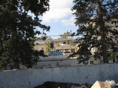 Camp wall with UN sign inside