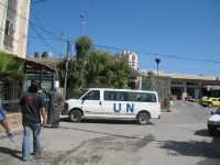 Old station wagon with "UN" painted on it