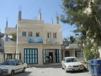 Office of IBDAA in storefront on right