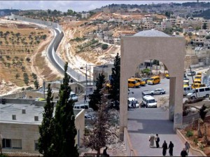 Rooftop view showing wall near university entrance